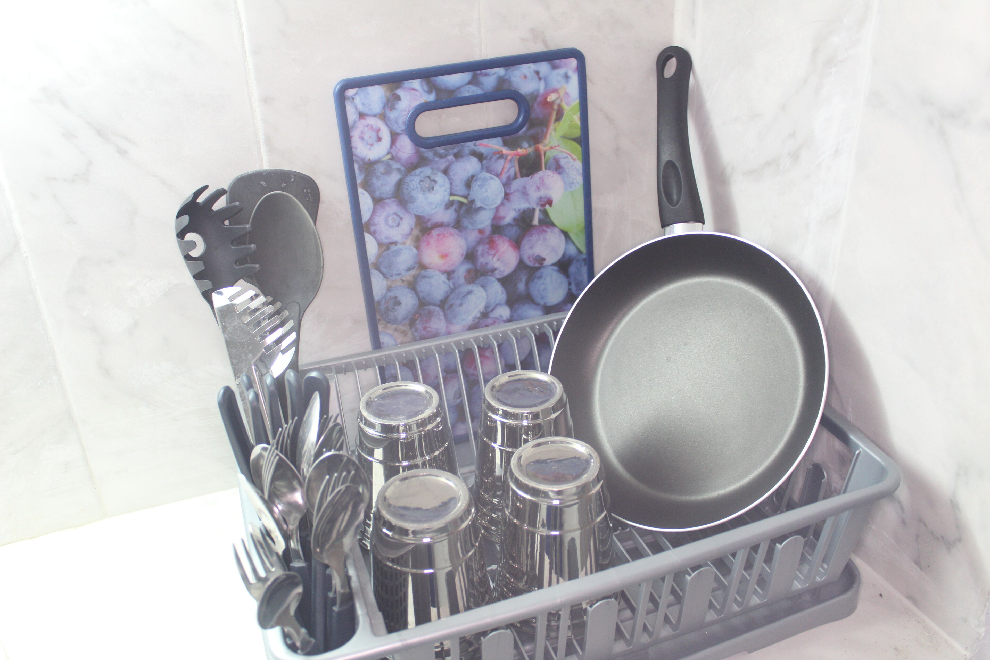 Fridge, microwave, coffee/tea maker, cookware/dishes/utensils