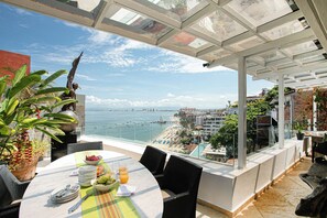 Outdoor dining - Amazing ocean view from this incredible 4 level beach house rarely rented before (Puerto Vallarta)