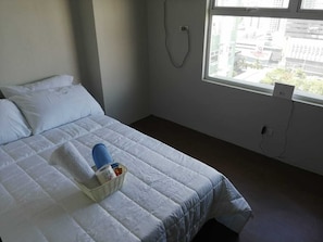 Enjoy a restful stay in this stylishly designed room with a comfortable bed and city views.