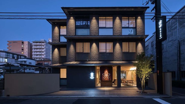 A modern two-story building with a flat roof and large windows. - Stay SAKURA Kyoto SUZAKU OJI (Kyoto)