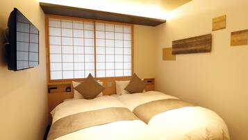 Blackout drapes, free WiFi, bed sheets