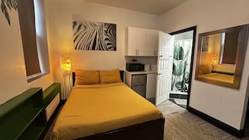 City Studio | Individually decorated, individually furnished, blackout drapes