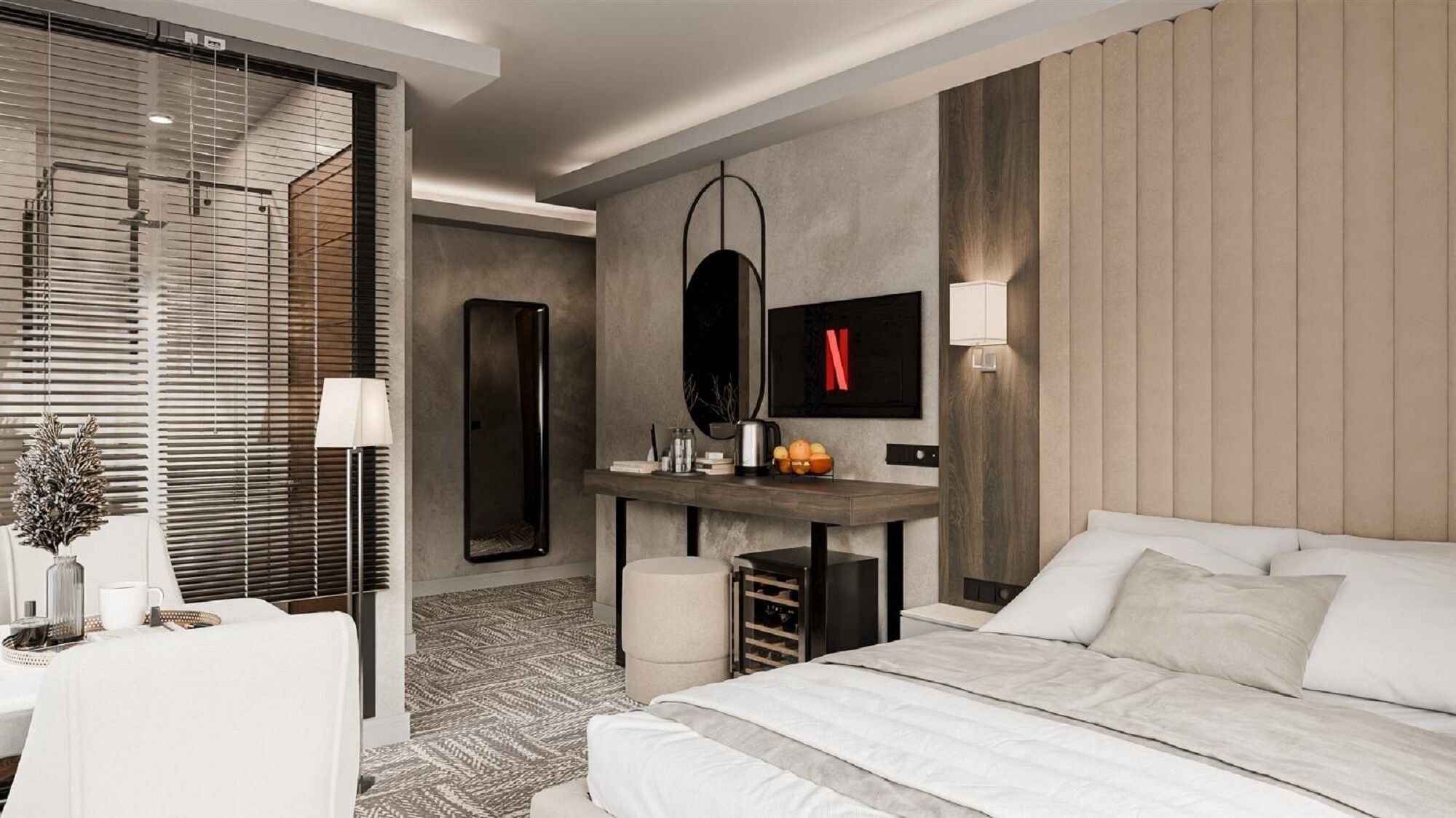 Moderni hotellihuone, jossa on sänky, työpöytä, peili ja televisio.