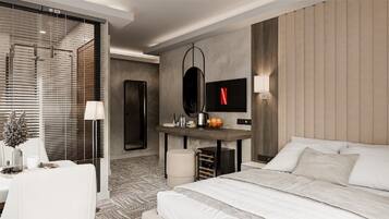A modern hotel room with a bed, a desk, a mirror, and a television.