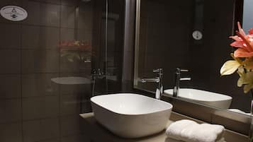 Hair dryer, towels, soap, shampoo
