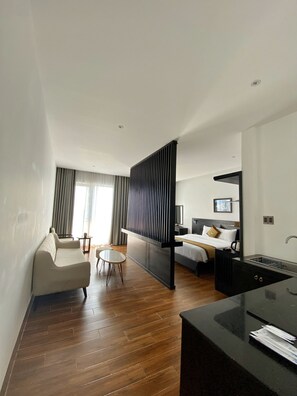 Habitación Premium, vista al océano | Ropa de cama de alta calidad y minibar 