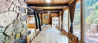 Iconic creekside mountain home with hot tub, fireplaces, balcony & amazing views