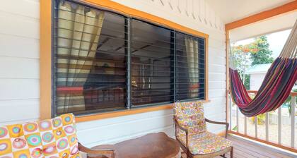 Charming cabana with a porch, hammock, strong WiFi, and a shared pool & grill