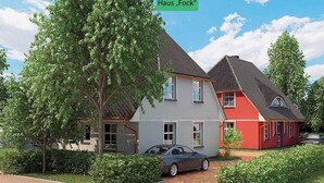 A two-story house with a car parked in the driveway. - Haus Fock - HausFock (Prerow)