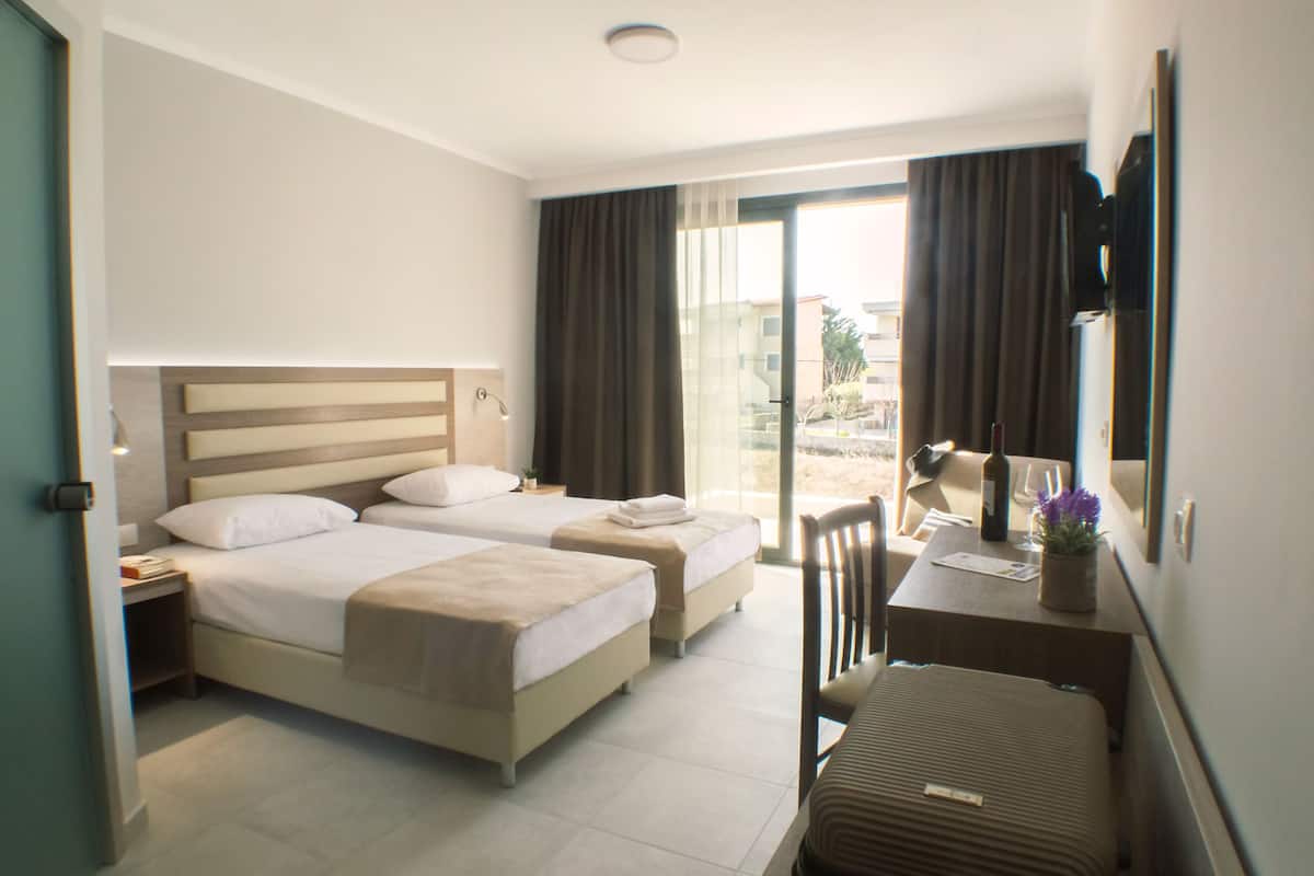 Habitación con 1 cama matrimonial o 2 individuales | Vista desde la habitación