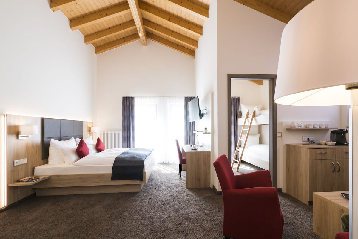 junior suite, 2 bedrooms | in-room safe, desk, laptop workspace, blackout curtains