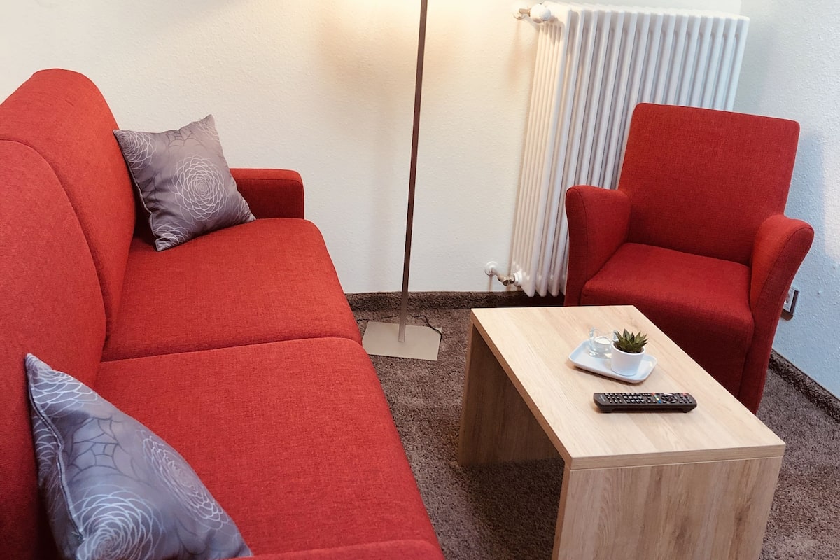 junior suite, 2 bedrooms | living area | flat-screen tv