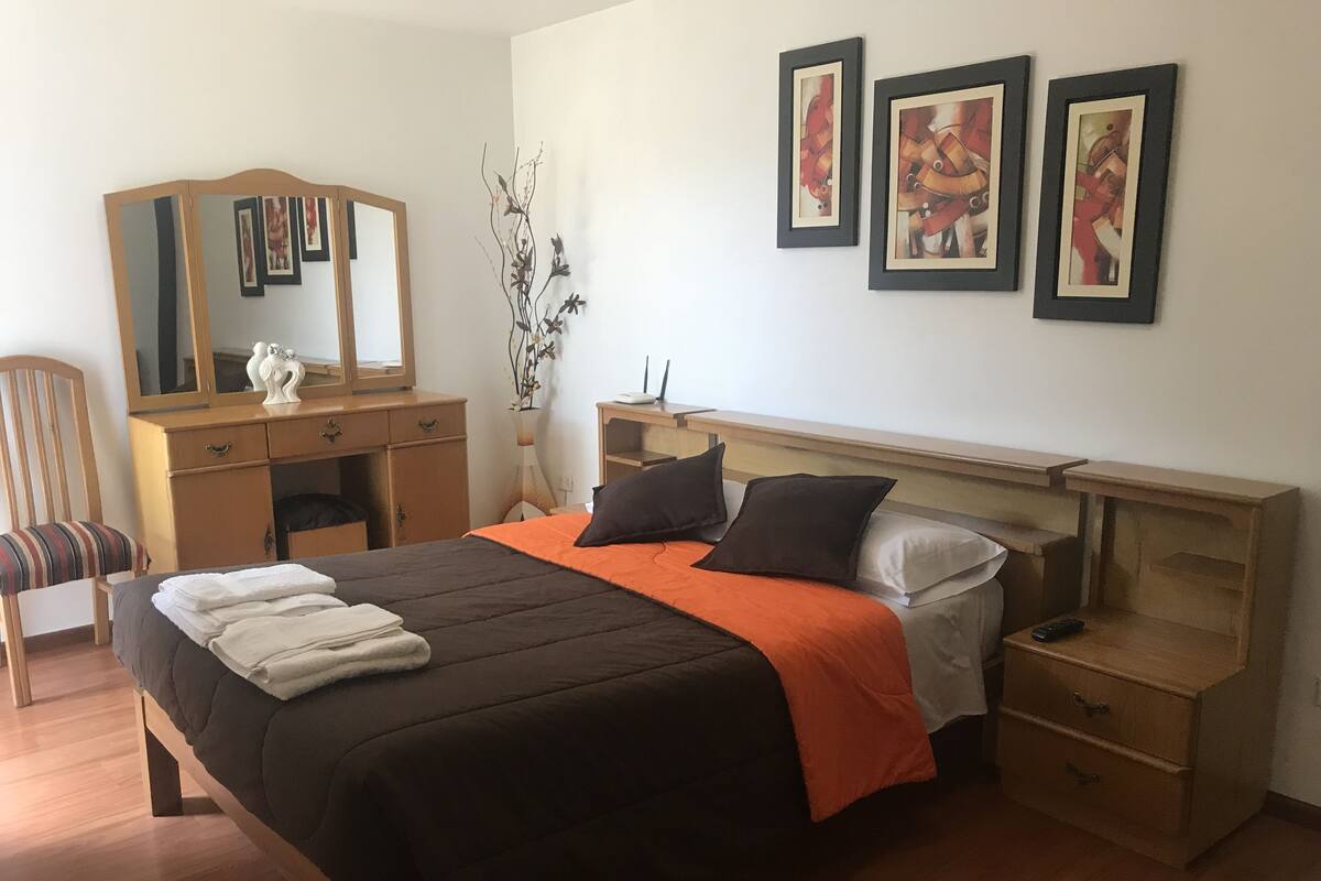 Premium bedding, laptop workspace, soundproofing, iron/ironing board