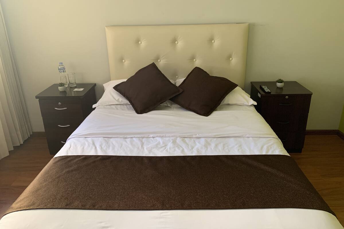 Premium bedding, laptop workspace, soundproofing, iron/ironing board