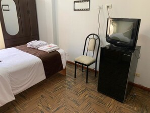 Premium bedding, laptop workspace, soundproofing, iron/ironing board