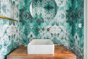 Bathtub, hair dryer, towels