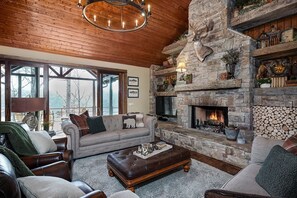 Smart TV, fireplace, table football, books