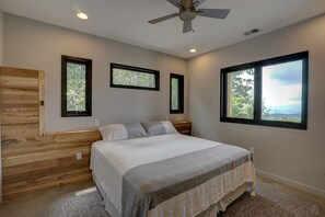 Falls Edge - lower king bedroom - 3BR mountain-modern cabin with exceptional views, fireplace, and fire pit. Free rafting train passes (Bryson City)