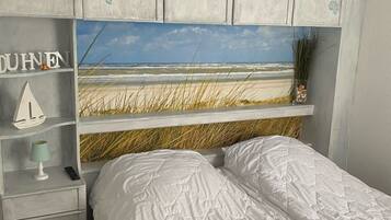 2 dormitorios y cuna de viaje