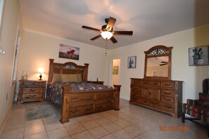 Queen size bed with rustic decor