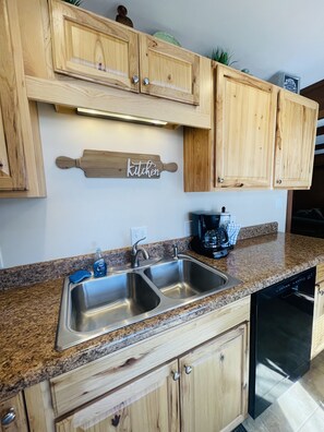 Fridge, microwave, coffee/tea maker, toaster