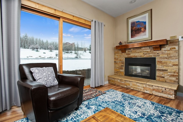 Cozy up by the fireplace