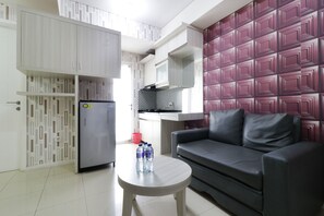 Apartment, 3 Bedrooms | Living room | LCD TV - Ten Eleven Living Point (Bandung)