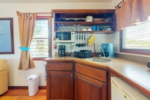 Fridge, microwave, stovetop, coffee/tea maker - Cabana with a porch, hammock, & view of the pool & grilling area (Hopkins)