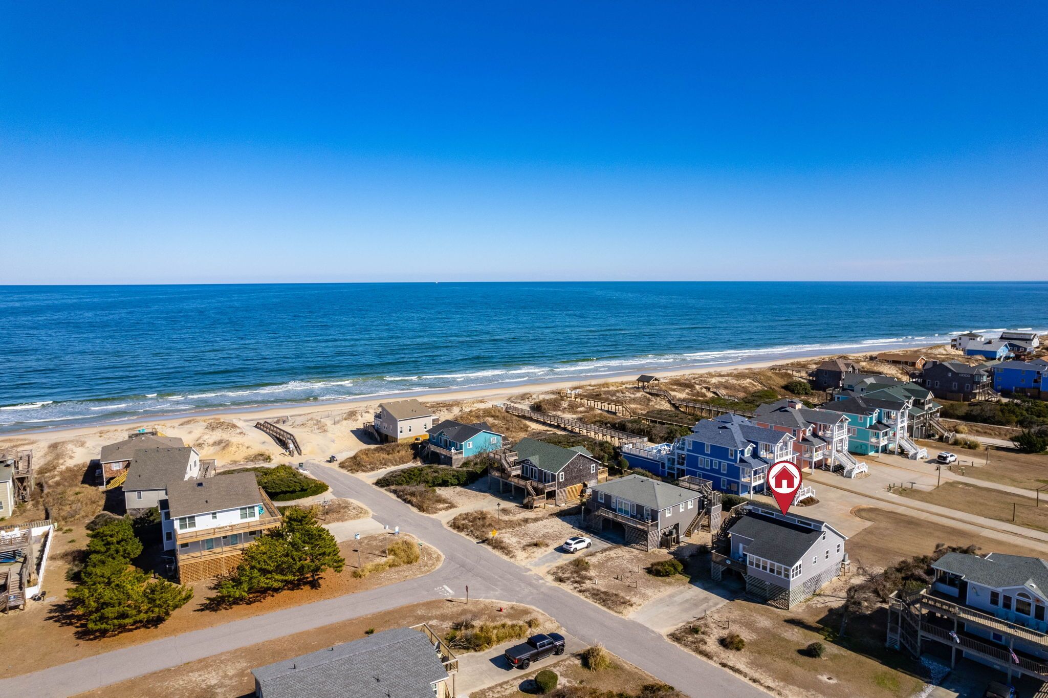 En la playa, sillas reclinables de playa