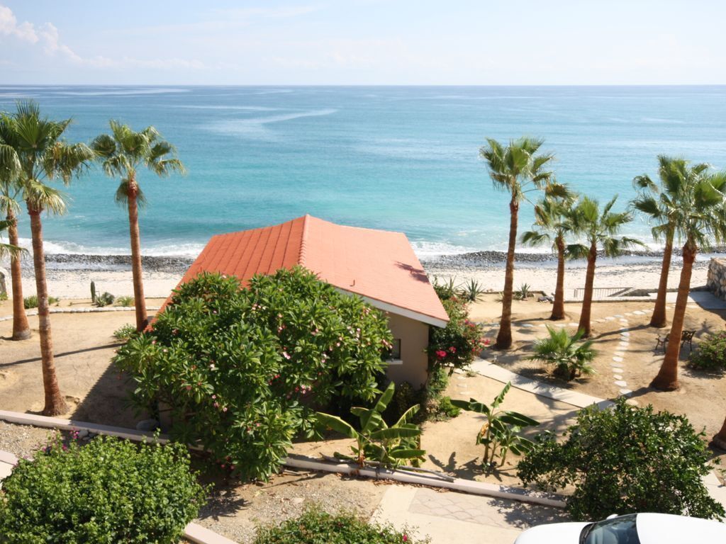On the beach, sun loungers, beach towels