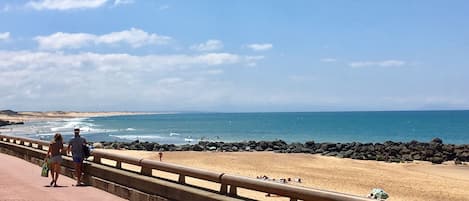 On the beach, sun loungers