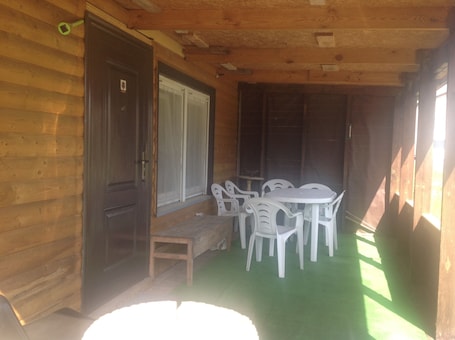 Outdoor dining. Paupio namelis prie Vorutos | Riverside cabin