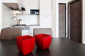 Private kitchen - GuestHost - Comfortable apartment located on the seventh floor of a modern residence equipped with a lift.In 40 square meters of space it comfortably accommodates 2 people with a double bedroom.Located in the Fonte Laurentina district, near the ring road (Roma)