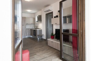 Fridge, dishwasher, electric kettle, cookware/dishes/utensils