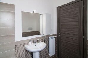 Bathtub, hair dryer, bidet