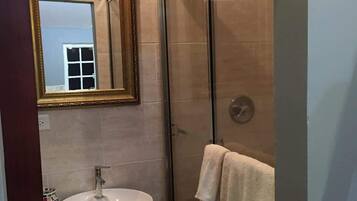 Shower, hair dryer, shampoo