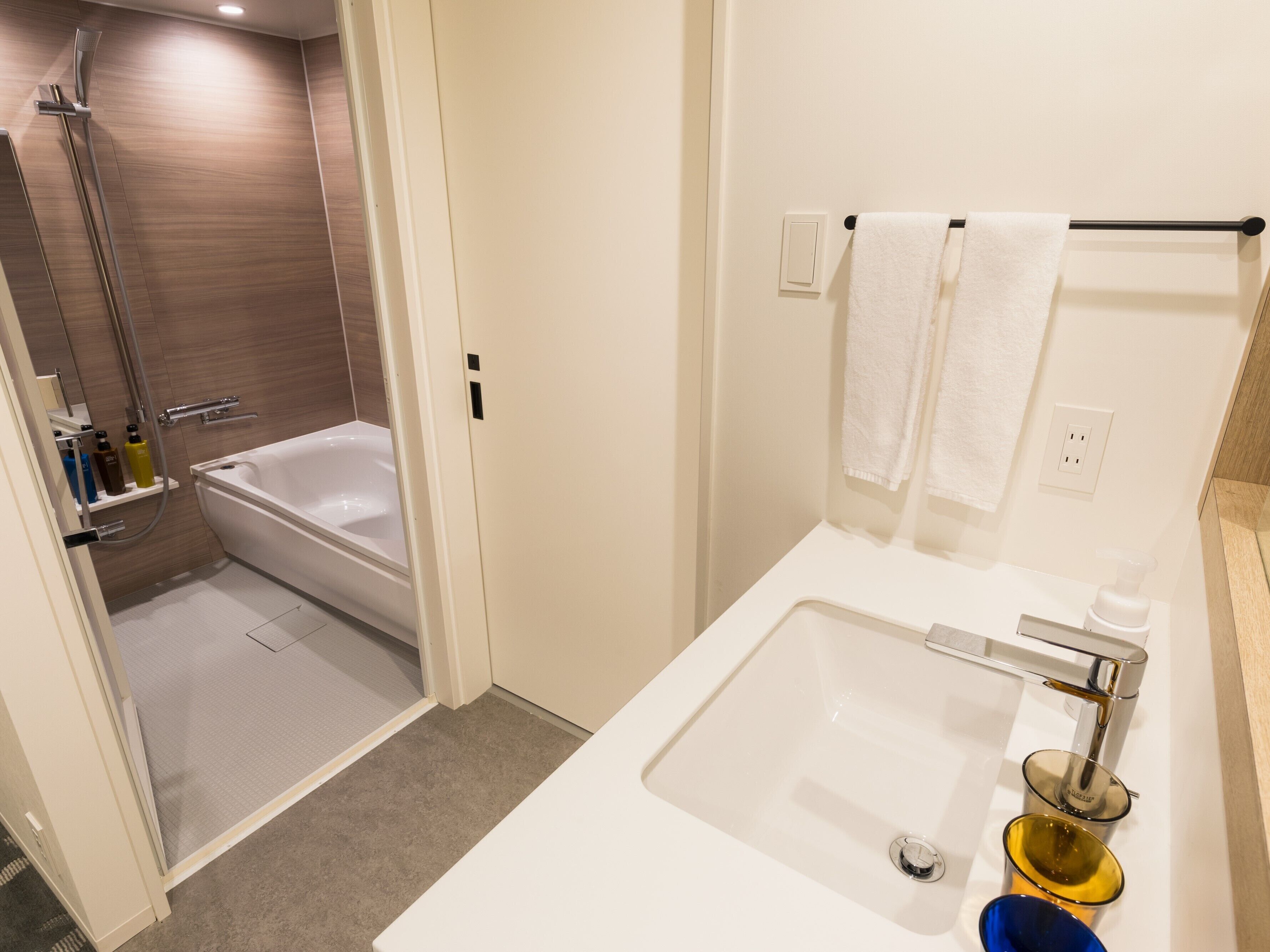 hair dryer, slippers, electronic bidet, towels