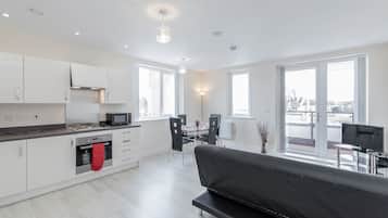 Apartment, 2 Bedrooms, Balcony | Living area | TV