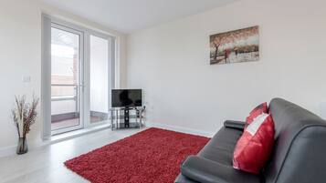 Apartment, 2 Bedrooms, Balcony | Living room | TV