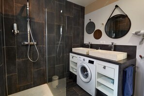 Shower, hair dryer, soap, shampoo