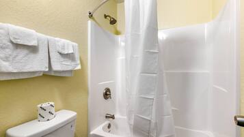 Standard Room, 1 King Bed, Non Smoking | Iron/ironing board, WiFi (free), bed sheets