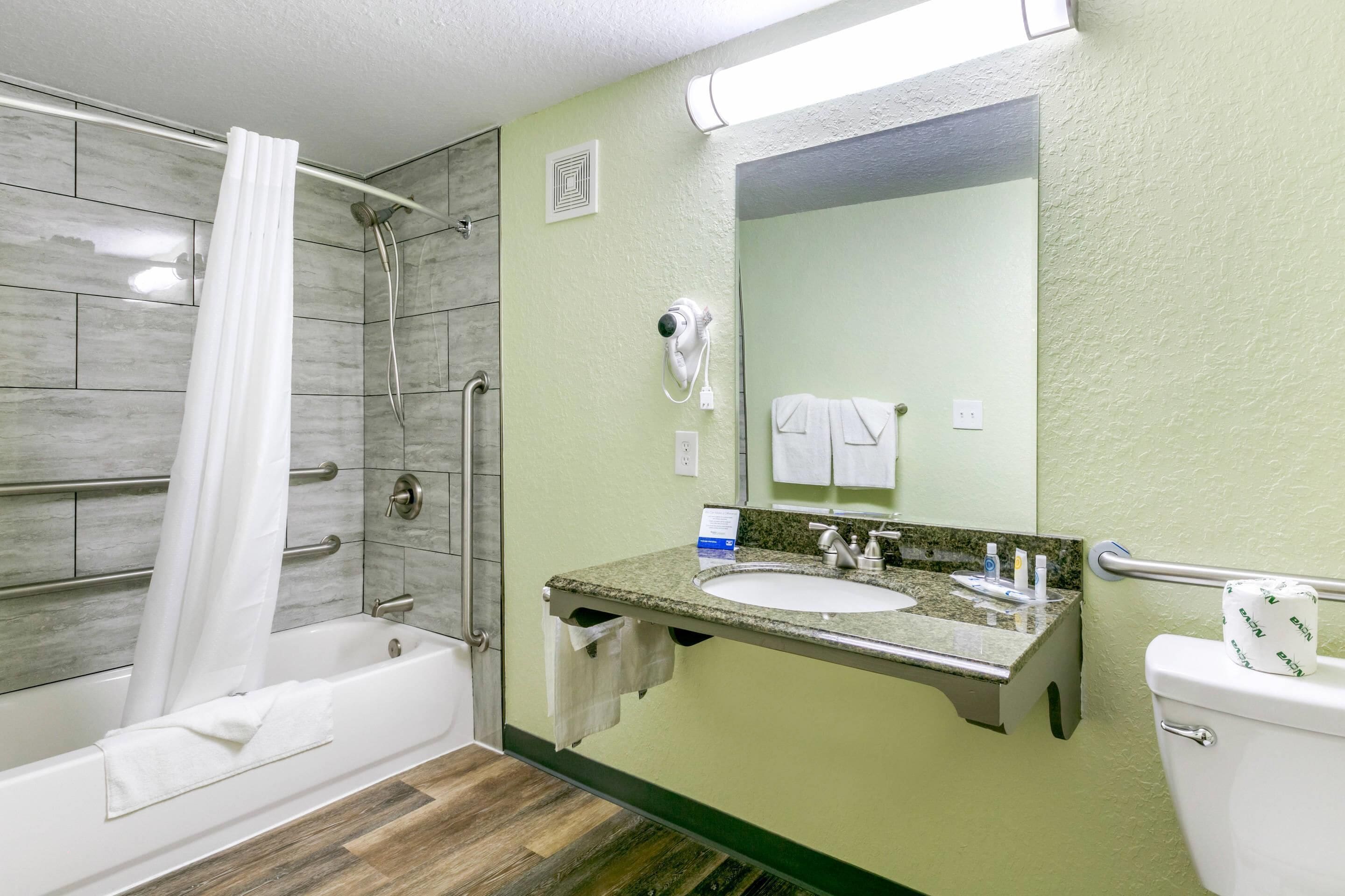 Room, 1 King Bed, Accessible, Non Smoking | Iron/ironing board, WiFi (free), bed sheets