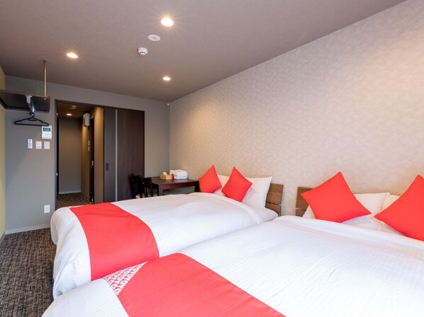 Kolmen hengen huone | Vuodevaatteet