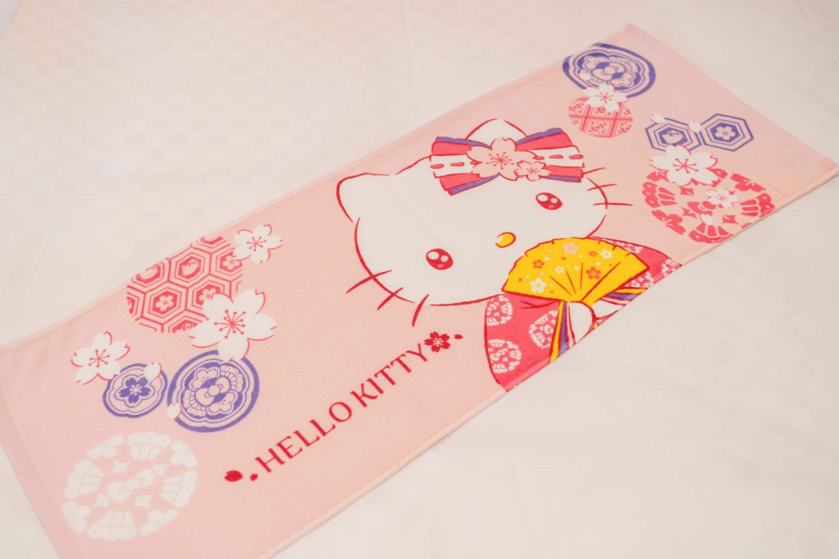 A Hello Kitty-themed item with a bow and fan design.