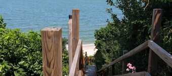 Beachfront cute cottage on Private  Beach. Best View on the Cape.  on high bluff