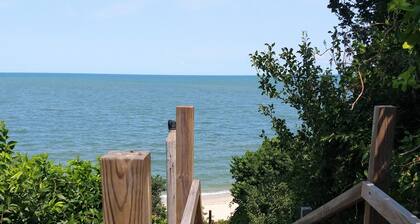 Beachfront cute cottage on Private Beach. Best View on the Cape. on high bluff