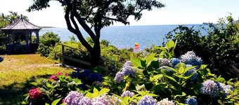 Beachfront cute cottage on Private  Beach. Best View on the Cape.  on high bluff