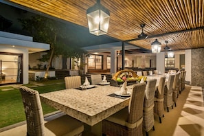 Outdoor dining - 11-bedroom private estate, ideal for large groups, families, retreats and celebrations. The estate accomodates up to 30 guests. Includes daily breakfast, a private chef, airport transfers, complimentary massages, dedicated driver and housekeeping. (Seminyak)