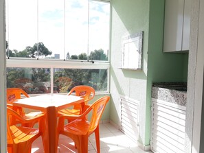 Enjoy a peaceful retreat with a balcony offering a view of the surrounding neighborhood.