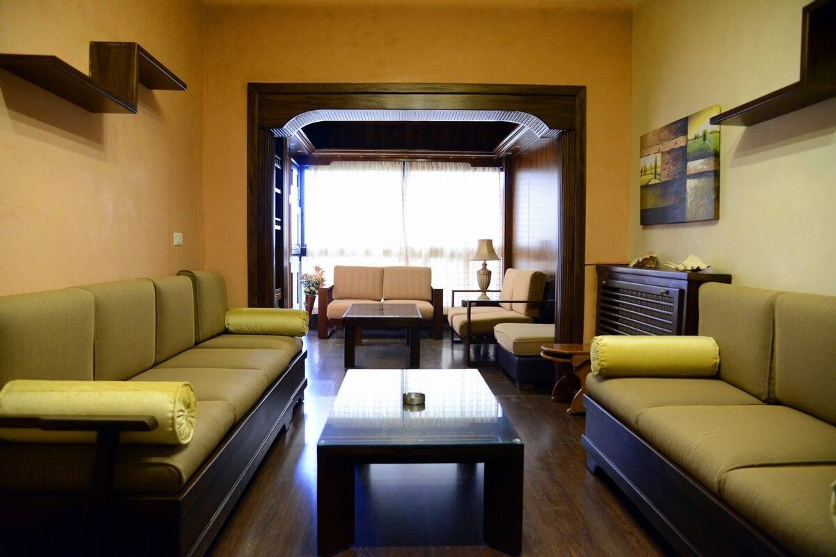 Comfort Chalet, 2 Bedrooms, Garden Area | Living area | 32-inch flat-screen TV with satellite channels, TV, fireplace